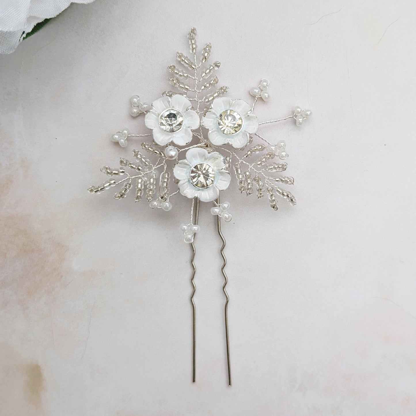 white floral hair pin detail - Susie warner